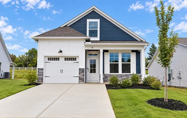 Colorful siding pairs beautifully with stone accen