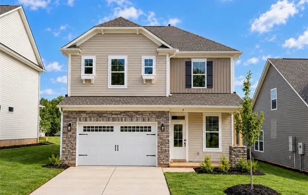 Craftsman styling with stone accents and a neat co