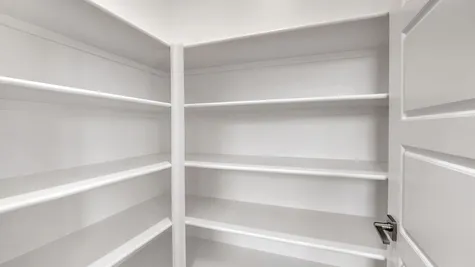 Walk In Pantry with Wood Shelving