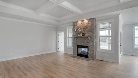 Family Room with Optional Coffered Ceiling and Indoor/Outdoor Fireplace with Stone Surround