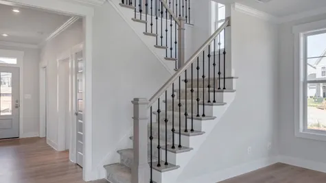Oak Stairs with Optional Runner and Iron Rails