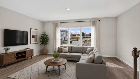 Image has been virtually staged to illustrate potential use of space. Furniture, décor, and finishes may not reflect the current condition of the home.