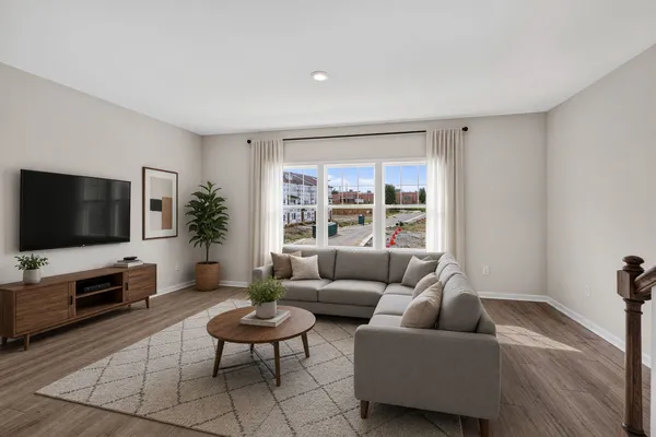Image has been virtually staged to illustrate potential use of space. Furniture, décor, and finishes may not reflect the current condition of the home.
