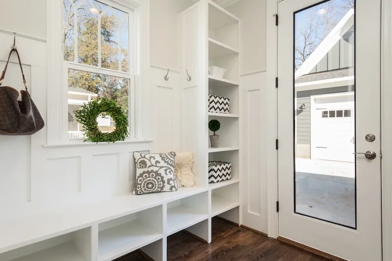 Mudroom With White Cubbies and Bench