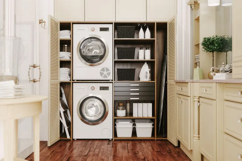 Organized Laundry Closet with Stacked Washer and Dryer