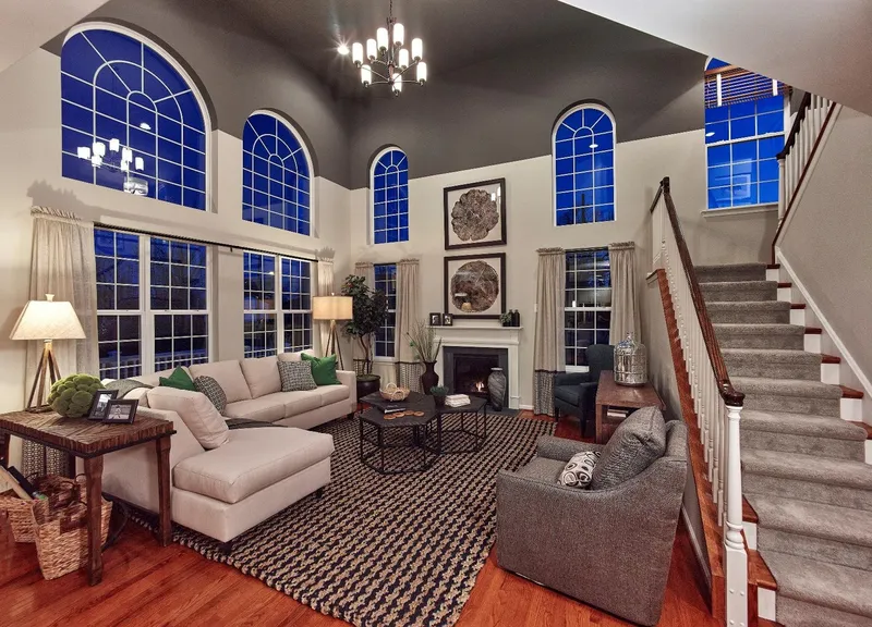 Living Room with High Ceilings and Lots of Windows in a Custom Hallmark Home