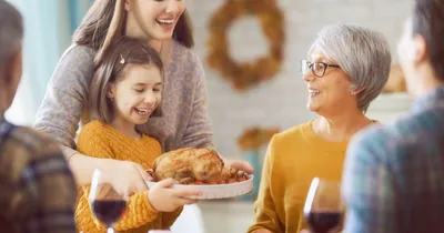 Three generations of women spending time together during the holiday season.