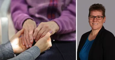 Image of senior holding hands with caregiver, image of Tabitha McIlhaney: Director of Wellness