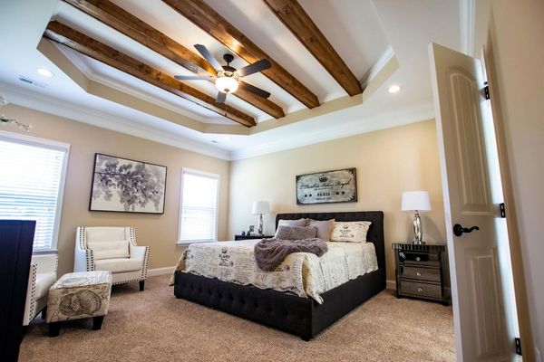 Tray Ceiling With Wood Beams in Bedroom from Hyde Homes