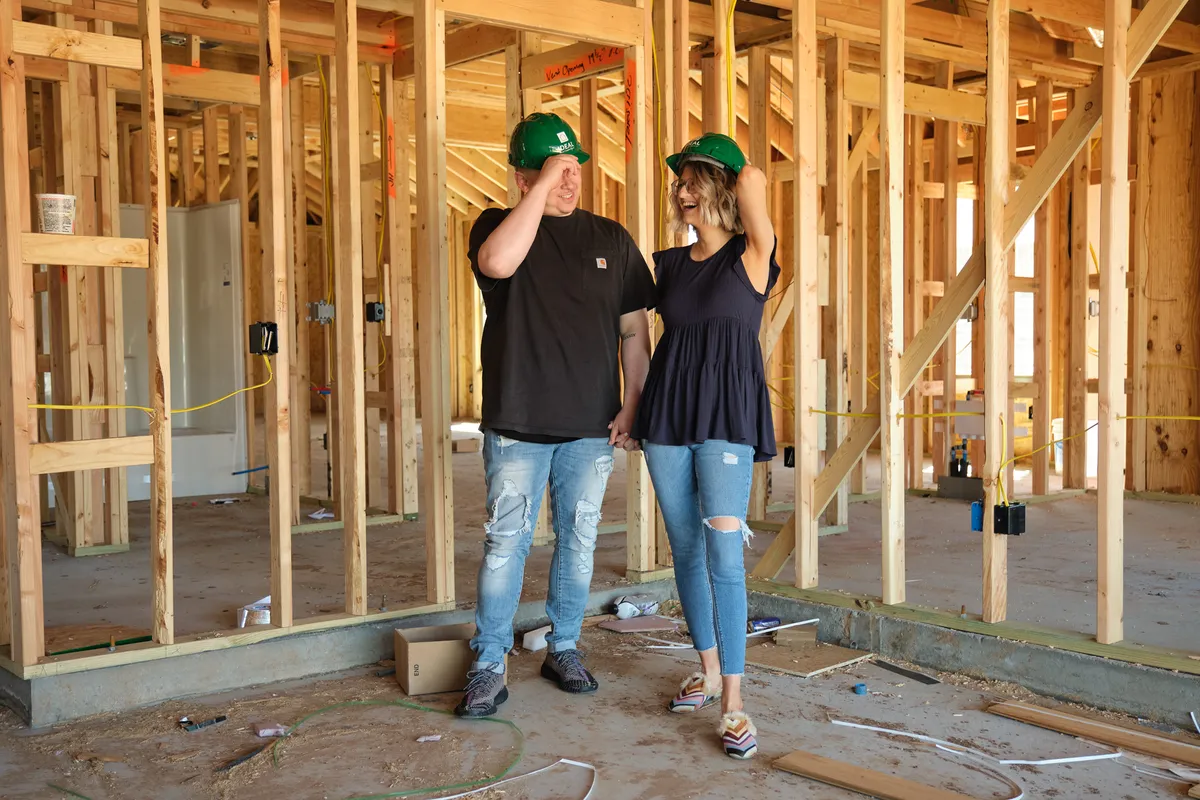 Homeowners inside home under construction