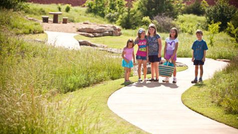 A family park in Red Canyon Ranch, a community of Norman OK new homes from Ideal Homes