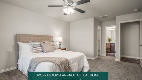 Ivory. Example photo of main bedroom in new home in Norman, OK