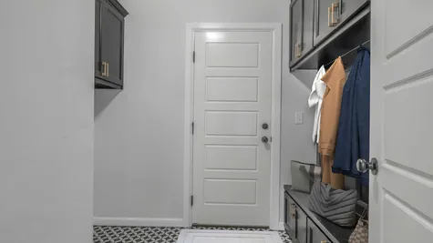 Forrester. Utility/Laundry Room with Mud Bench