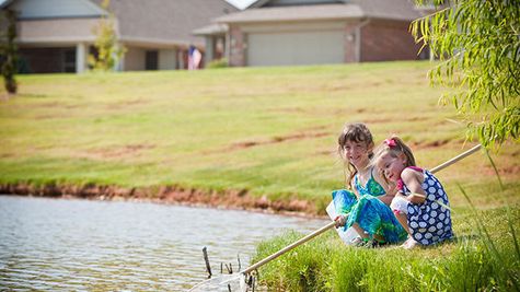Children at a Featherstone Community park around our new homes in Moore OK from Ideal Homes