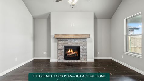 Fitzgerald. Example photo of living room in new home in Norman, OK