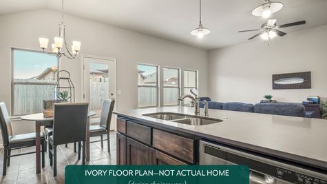 Ivory. Example photo of kitchen in new home in Norman, OK