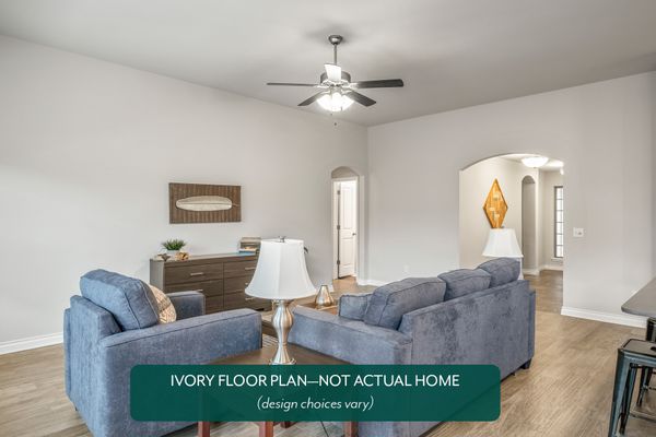 Ivory. Example photo of living room in new home in Norman, OK