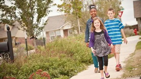  Family in Trail Woods, a community of Norman OK new homes from Ideal Homes