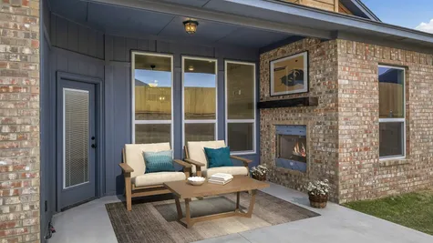 Kendall. Covered Patio with Fireplace