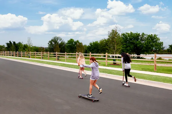  Scooters and skateboarding around new community in Moore/OKC