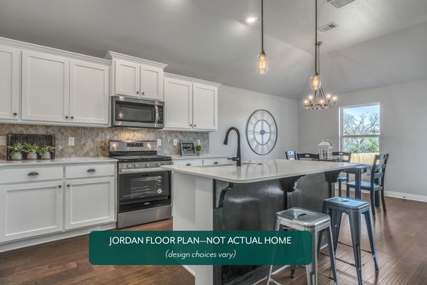 Jordan. Kitchen and dining area in new home in Norman, OK