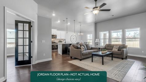 Jordan. Living room, kitchen, and study in new home in Norman, OK