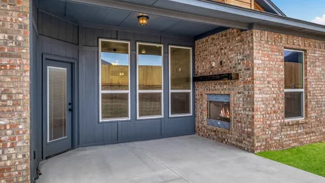 Kendall. Covered Patio with Fireplace