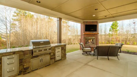 Homeowners in Sinclair community by Ivey Homes have their very own exclusive Clubhouse including outdoor grilling and entertainment area.