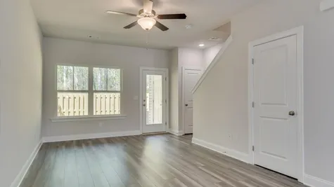Main living area of a new construction townhome by Ivey Homes located at 878 Rachel Branch Forrest Bluff in North Augusta, SC, featuring modern design and ready for immediate move-in.