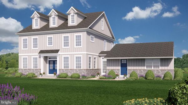 Artist's rendering of new consturctin home with covered double door enty, stone water table, grey board and batten siding, blue doors