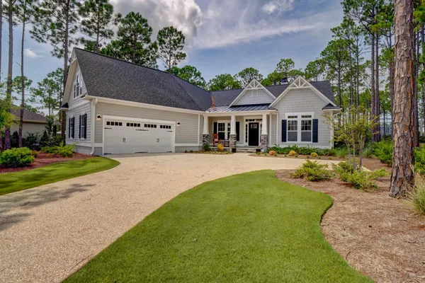 Exterior image of home in the new home community of highlands at boiling spring lakes by logan homes