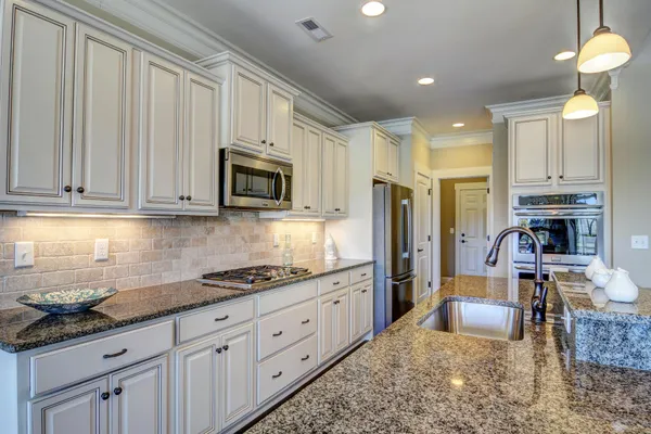 kitchen in a new home at dataw island in st helena island sc by logan homes