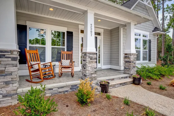 Exterior image of new home front porch at the reserve at beaumont oaks by logan homes