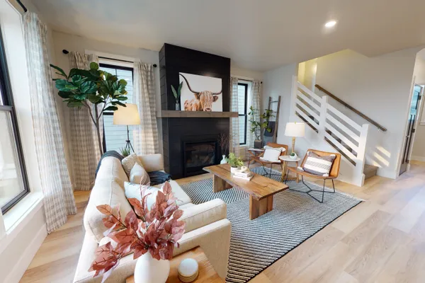 spacious living room in a new home community by mccall homes
