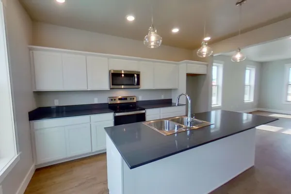 kitchen in a new fourplex by mccall homes in billings mt
