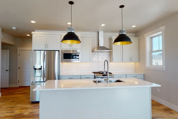 spacious kitchen in a new home by mccall homes