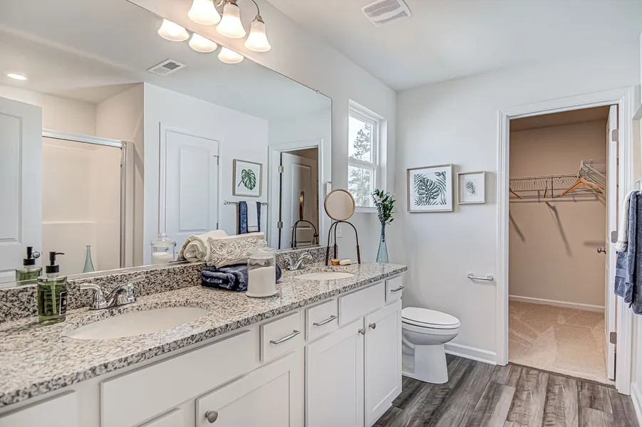 bathroom with double sinks in a new home in richmond hill, ga