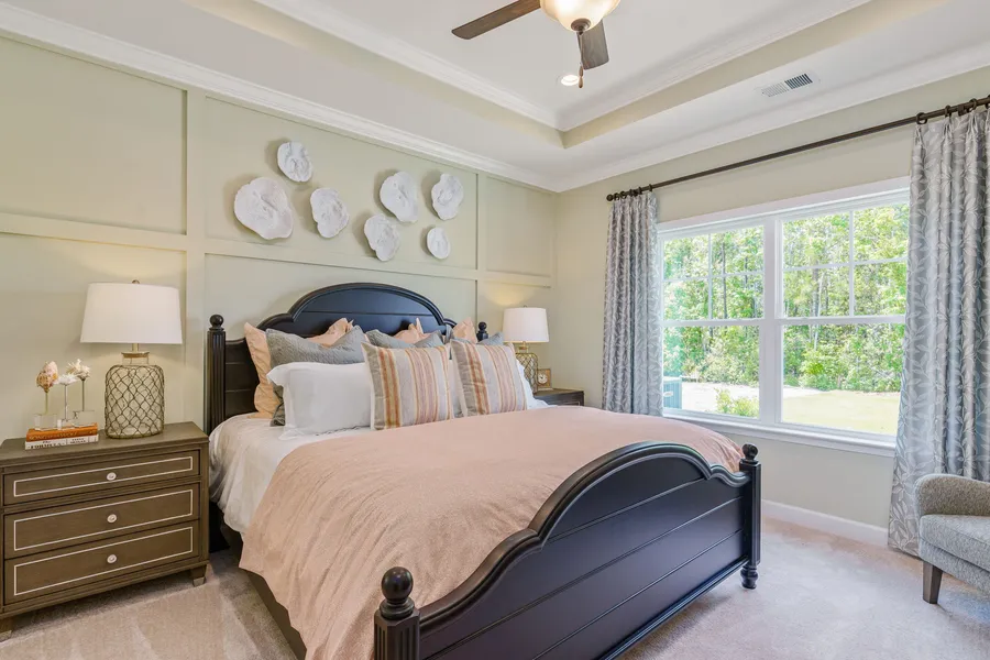 Primary bedroom in new construction home in bluefield by mungo homes