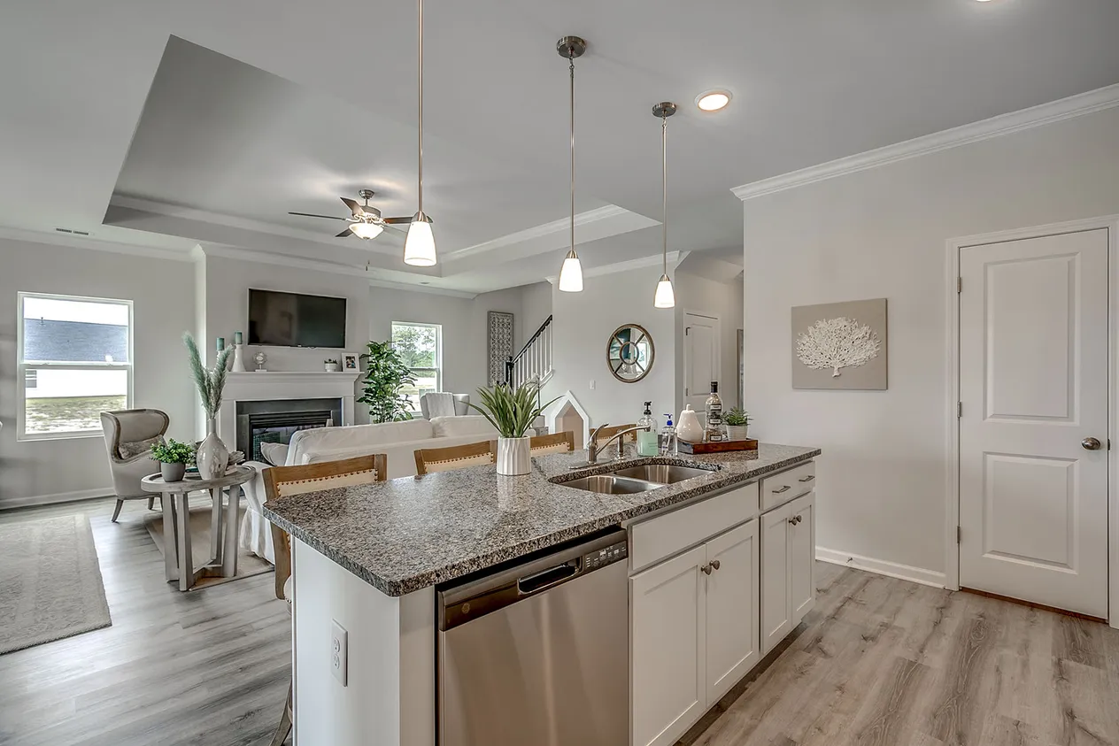 Gwinnett | Kitchen Opens to Great Room with Trey Ceiling Detail