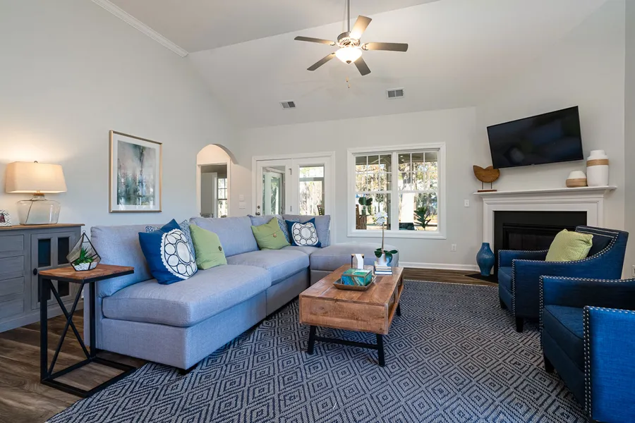 living room in a new home community, cypress village, by mungo homes