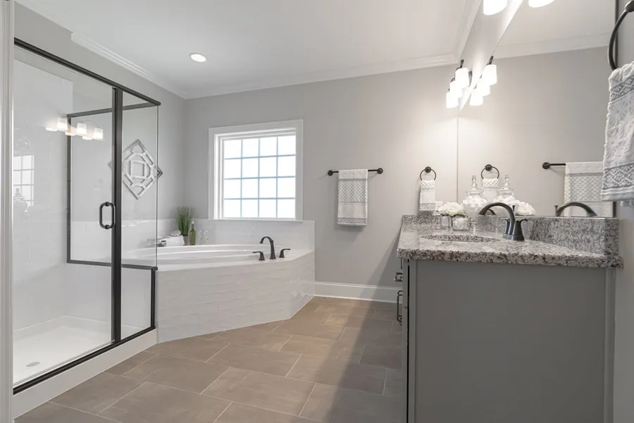 Primary bathroom new construction home by Mungo Homes
