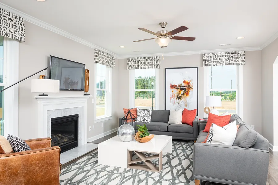 living room in a new home community, cottages at lake emory, by mungo homes