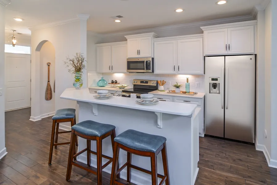 White open concept kitchen in new home in james island sc