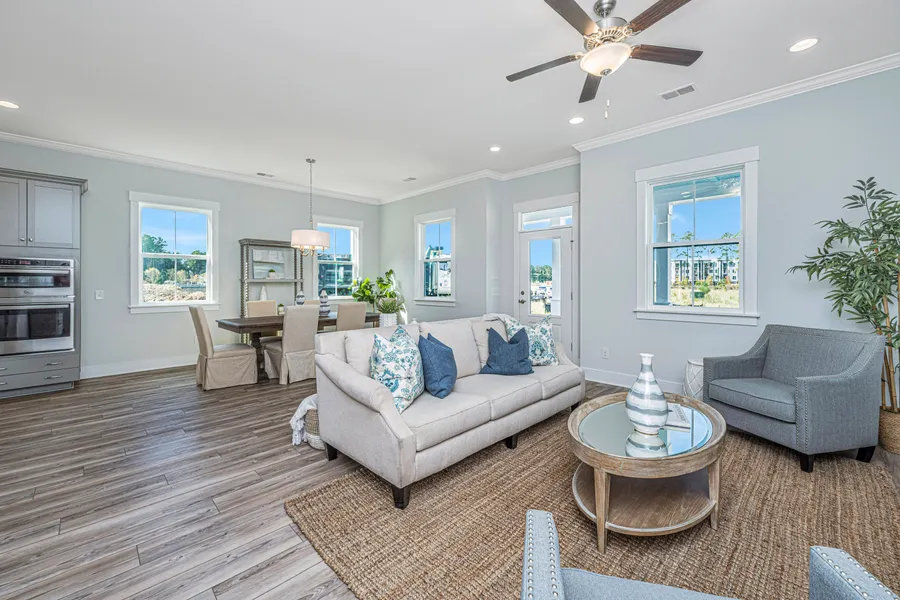 great room in a new home community, providence farm, by mungo homes