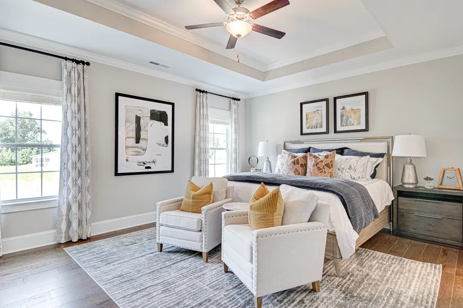 Primary bedroom in new construction home by Mungo Homes in mount pleasant, sc