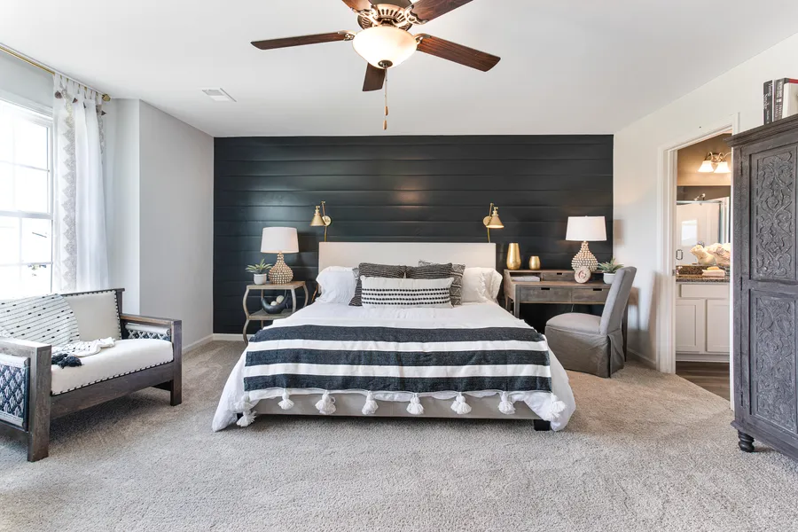 Primary bedroom in new construction home by Mungo Homes