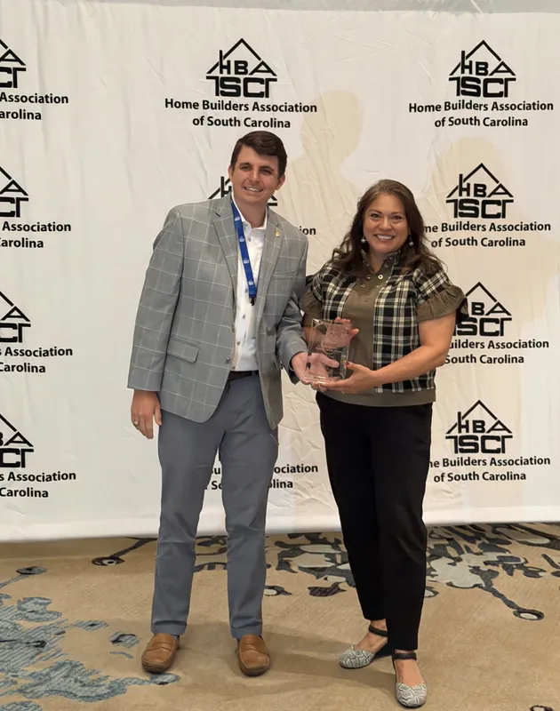 Mungo Homes receiving Pinnacle Awards