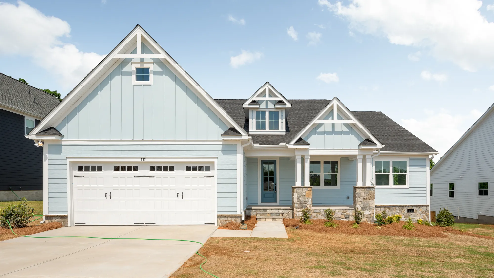 exterior of a new home in the juniper grove community by enchanted homes