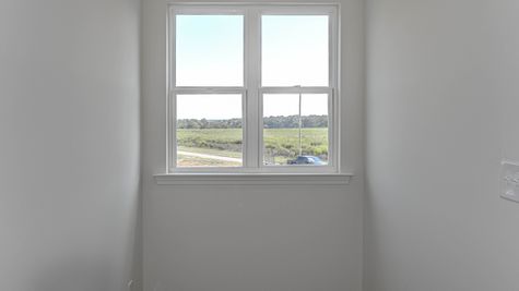 interior photo of hallway with large window view