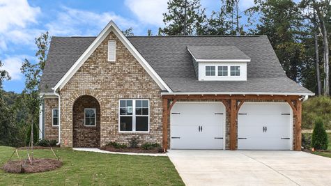 Exterior photo of 1 story Coleman floorplan with brick and cedar accents